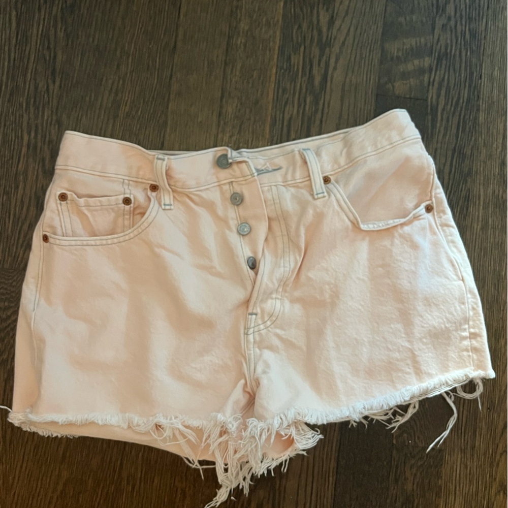 Levi’s Light Pink Frayed Denim Shorts